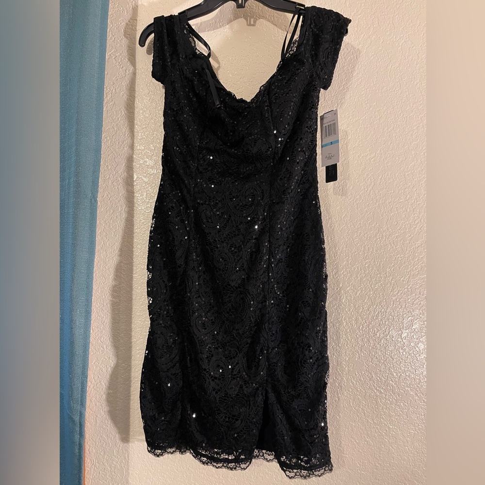 Selling a black dress from the brand sequin hearts
